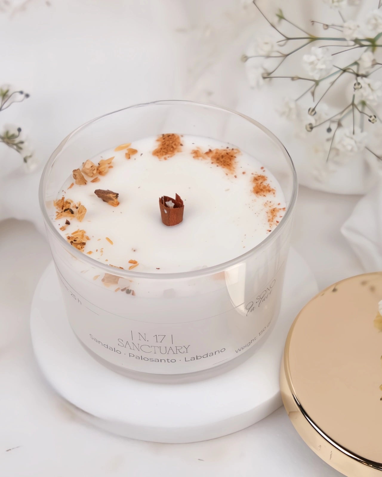 Candela Hygge - candele botaniche profumate in cera di soia con stoppino di legno crepitante come un camino - profumo di palo santo