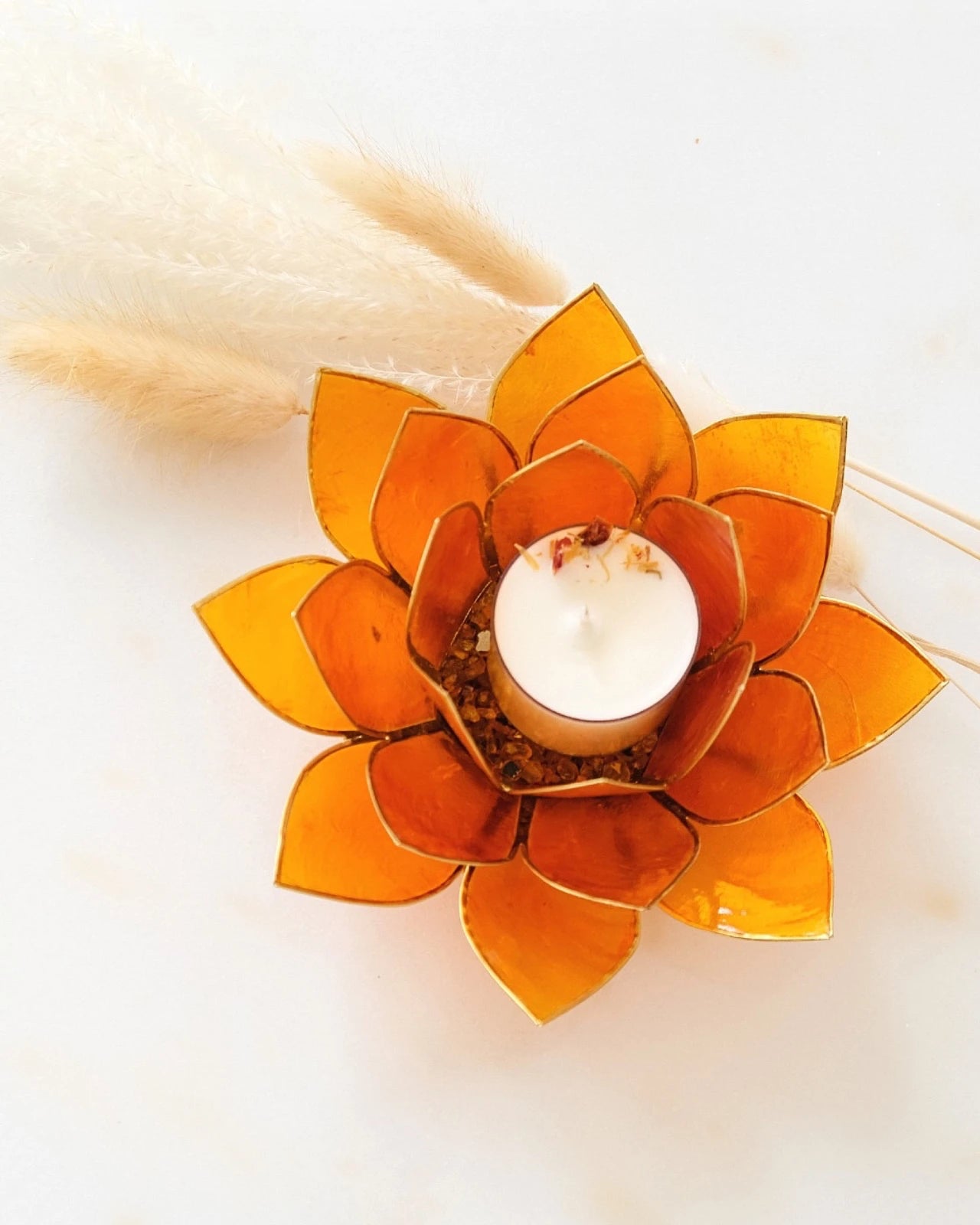 Puro: portacandele a forma di fior di loto in conchiglia colore arancione