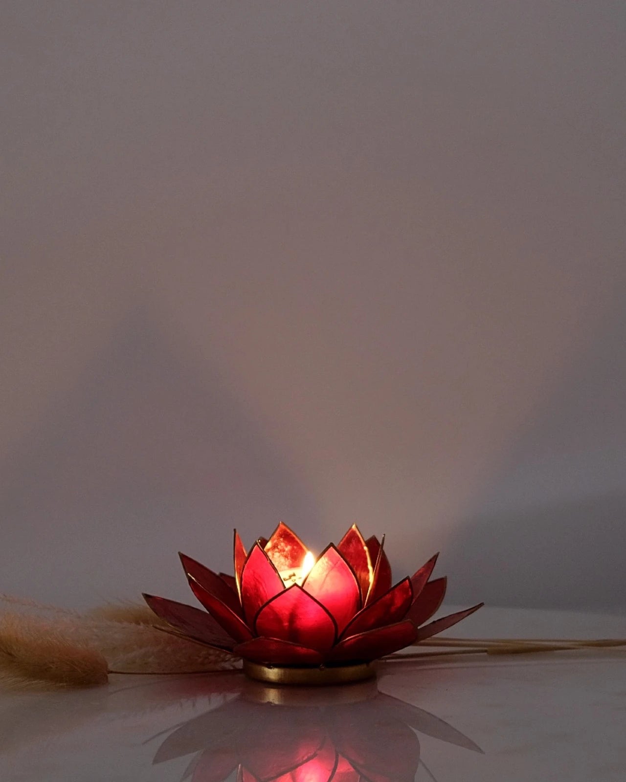 Puro: portacandele a forma di fior di loto in conchiglia