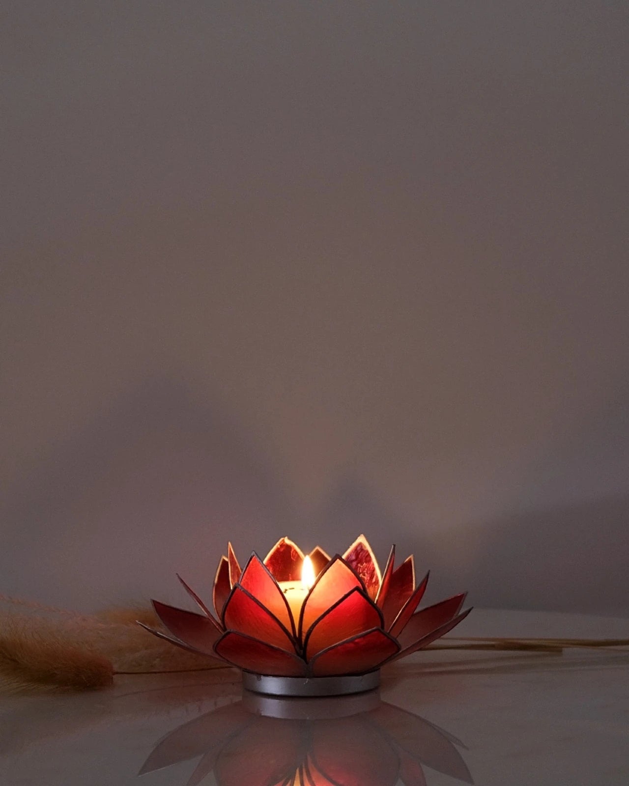 Puro: portacandele a forma di fior di loto in conchiglia