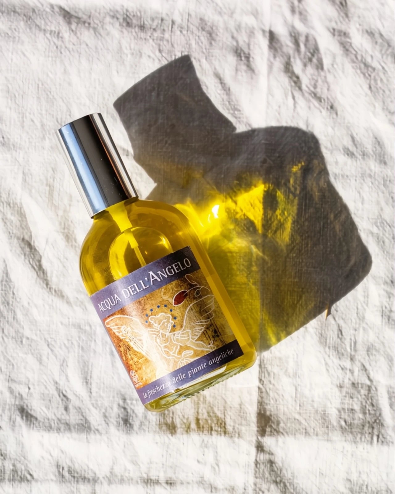 acqua dell'angelo di Olfattiva - profumo botanico naturale con oli essenziali di litsea, bergamotto, mirto e incenso
