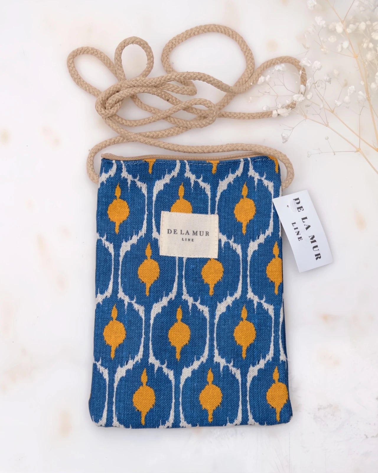 borsa portacellulare in tessuto artigianale con tracolla e stampa design Brad