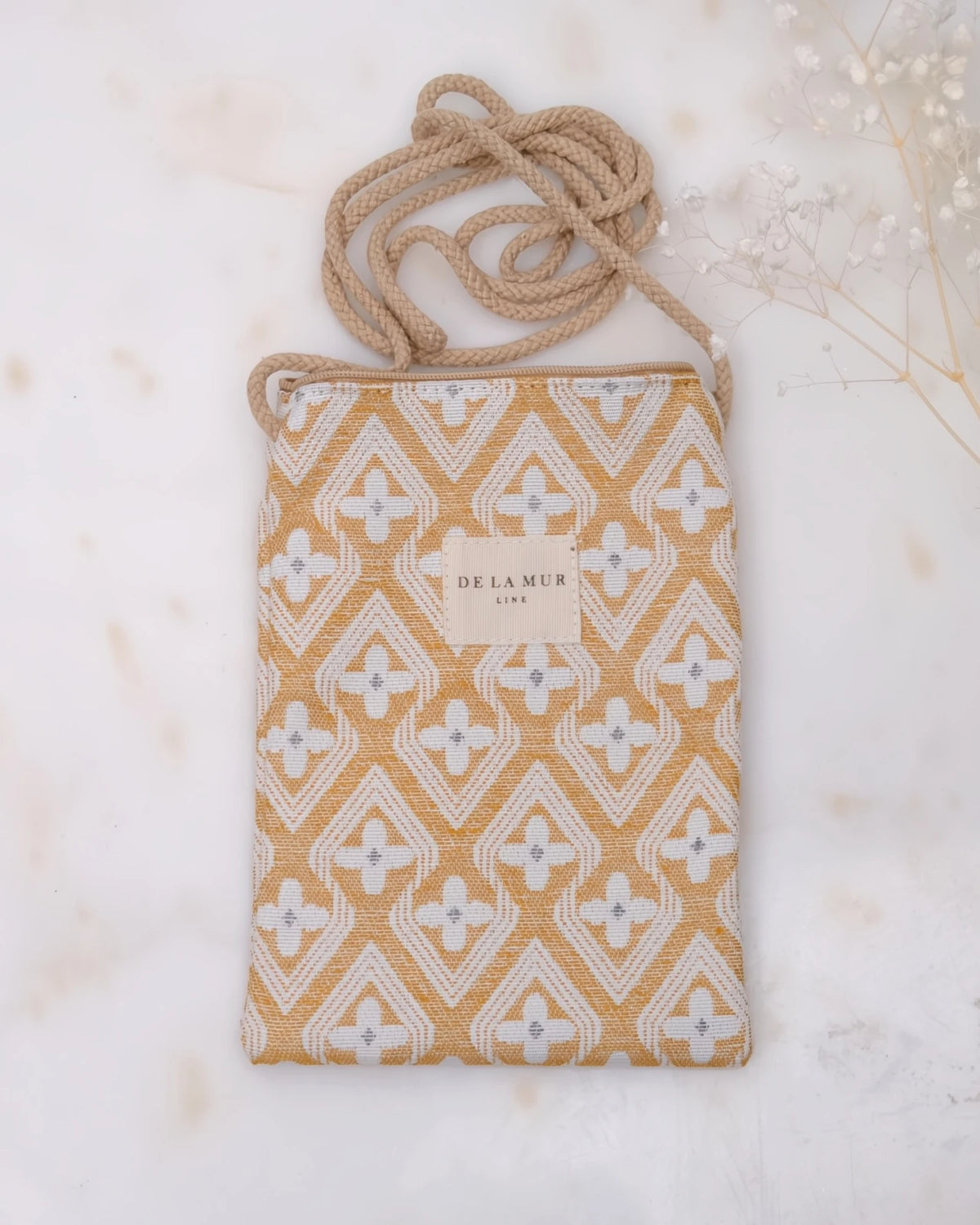 borsa portacellulare in tessuto artigianale con tracolla e stampa design raxo