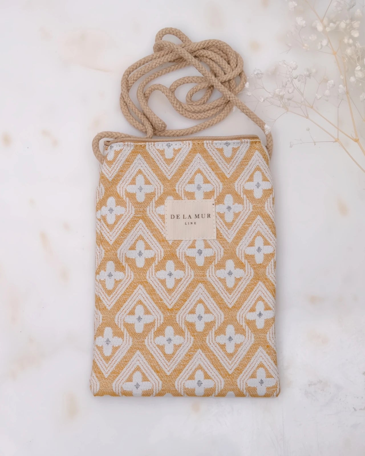 borsa portacellulare in tessuto artigianale con tracolla e stampa design raxo