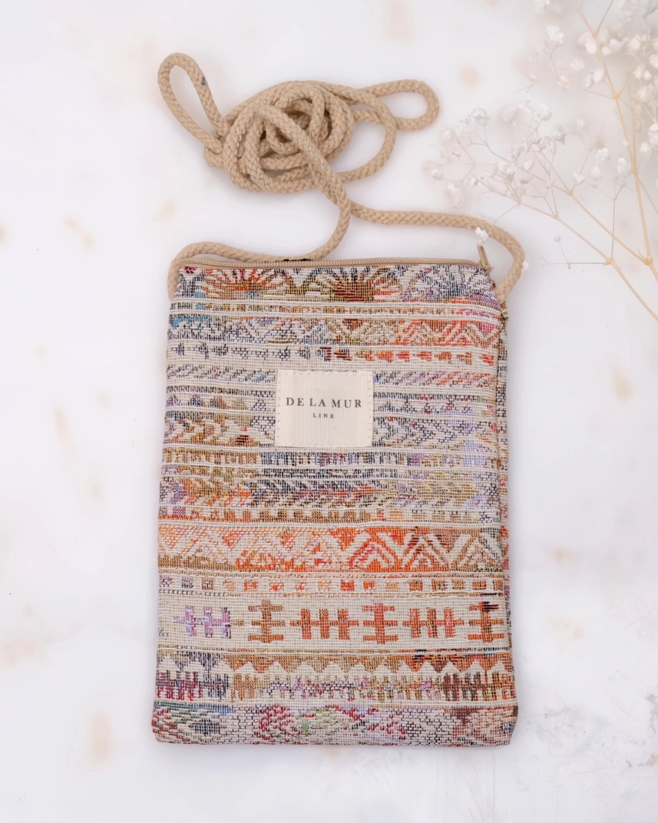 borsa portacellulare in tessuto artigianale con tracolla e stampa design sire