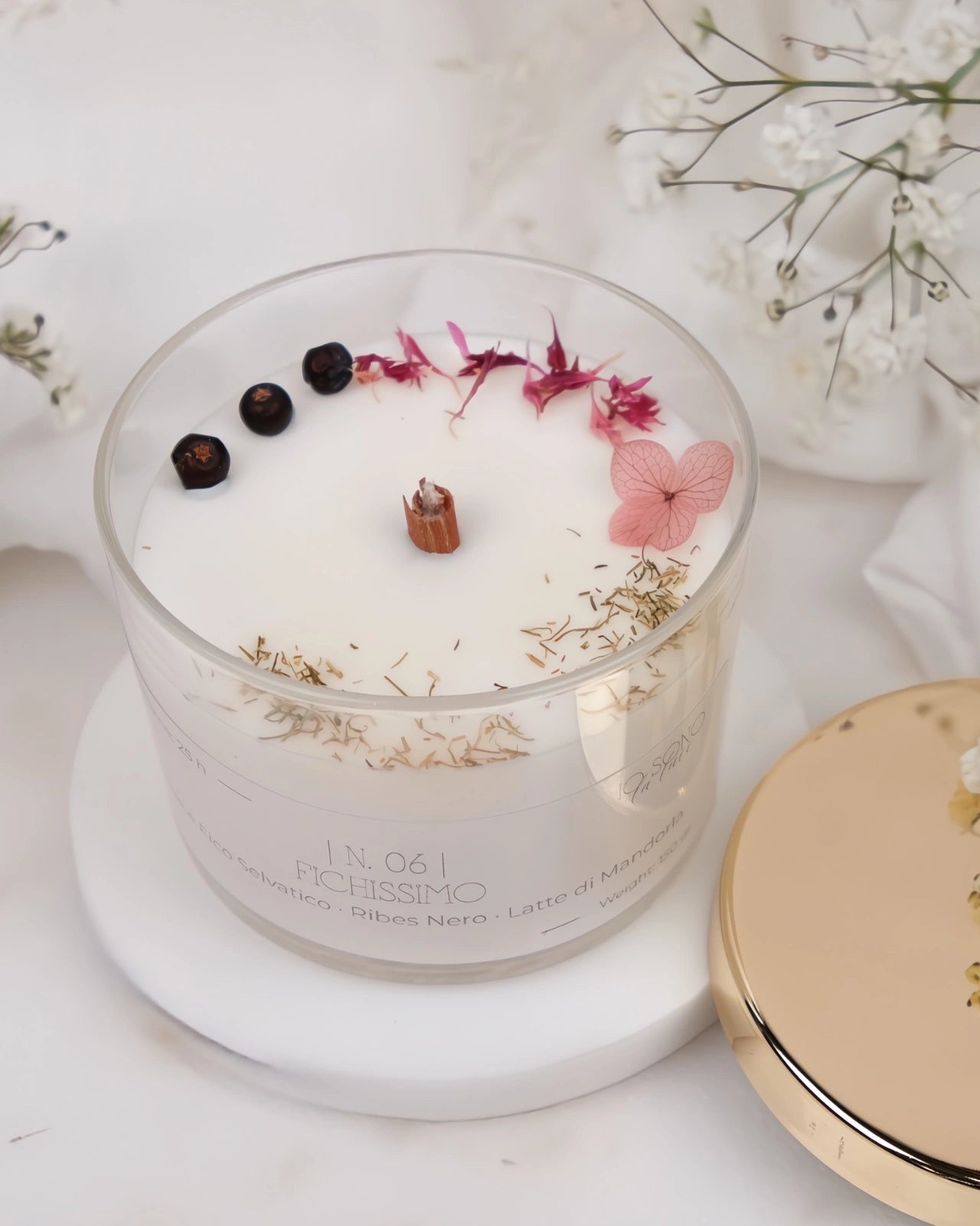 Candela Hygge - candele botaniche profumate in cera di soia con stoppino di legno crepitante come un camino - profumo di fico 