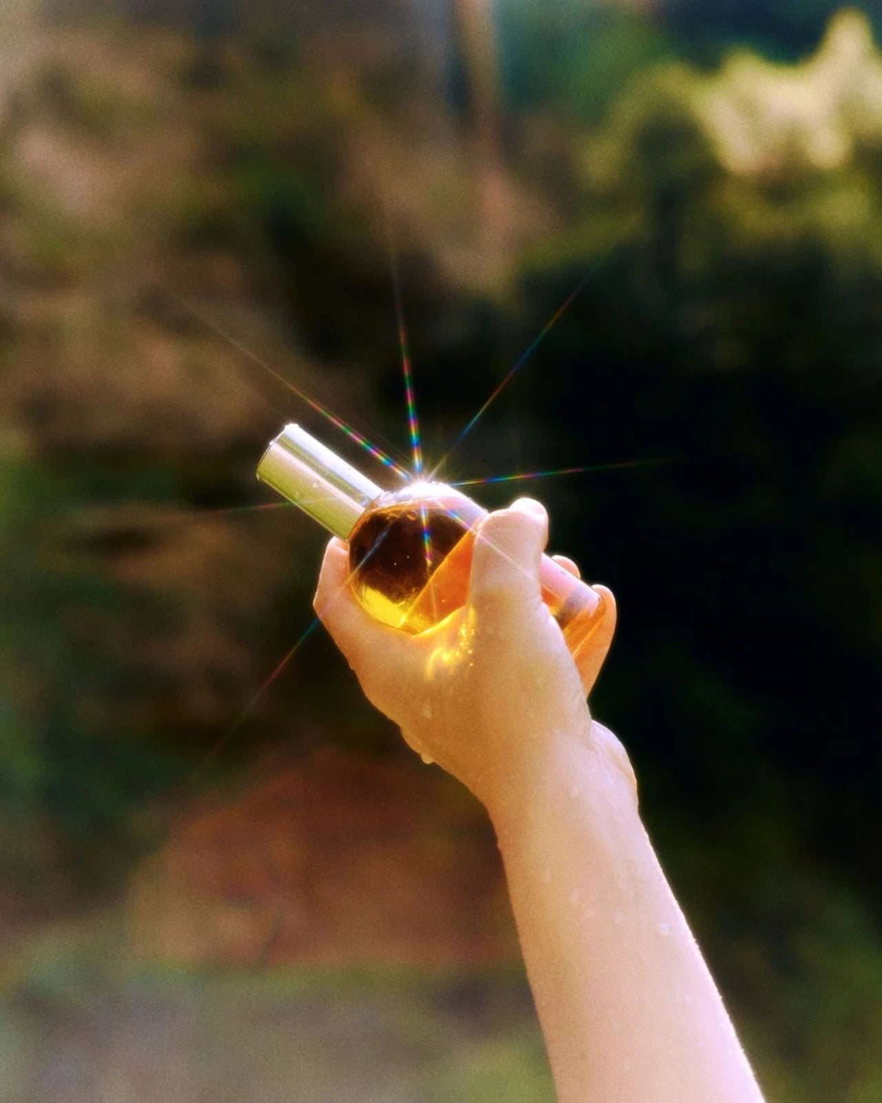 profumo botanico naturale con oli essenziali di arancio, lista, palo santo e cedro | olfattiva | luce | roma