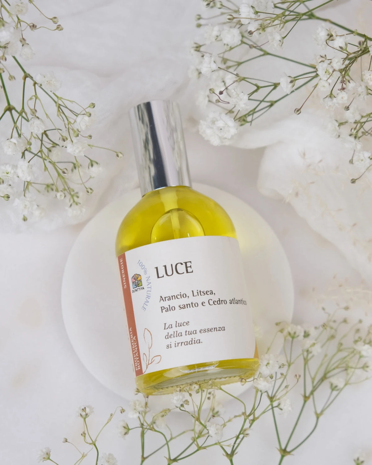 profumo botanico naturale con oli essenziali di arancio, lista, palo santo e cedro | olfattiva | luce | roma