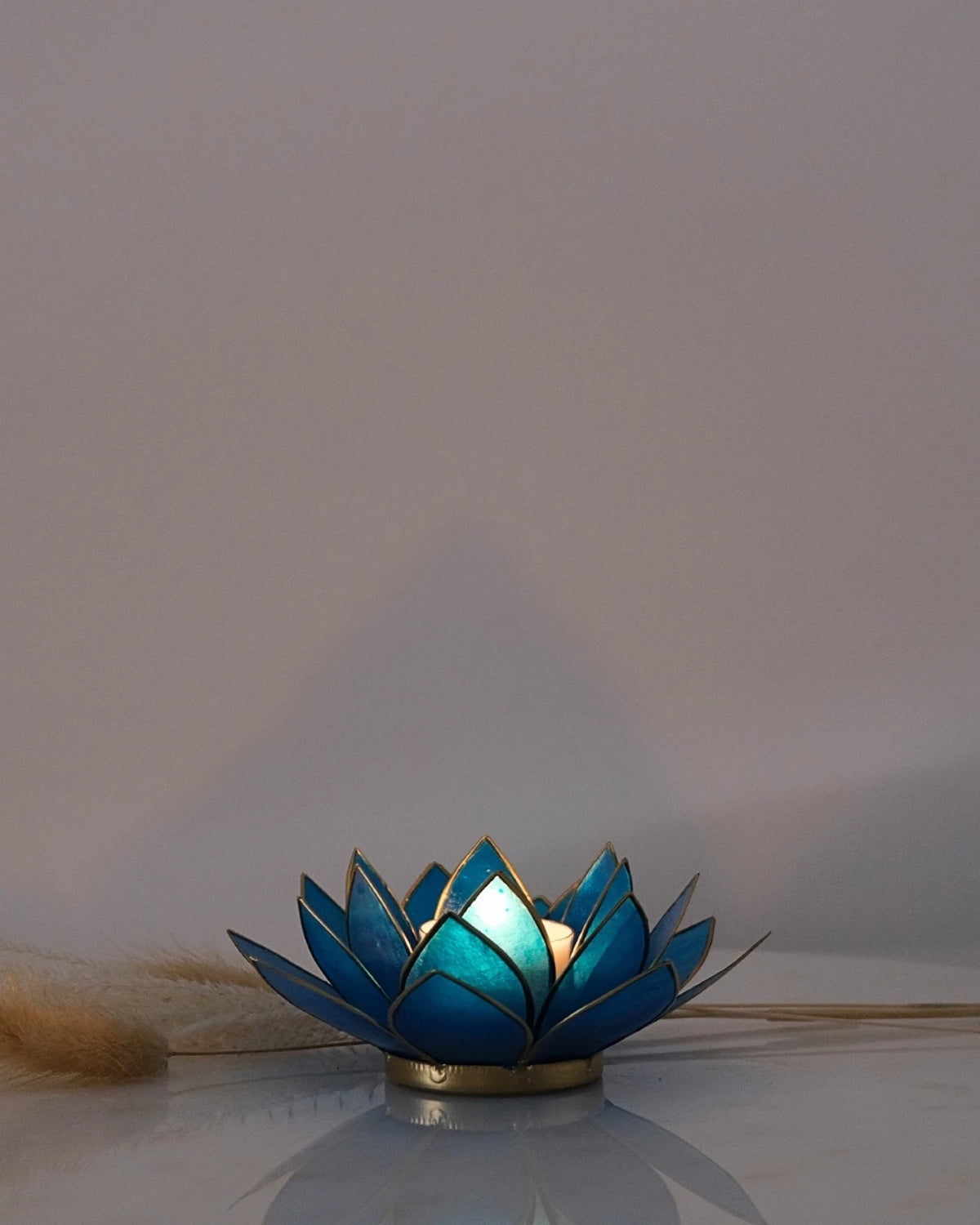 Puro: portacandele a forma di fior di loto in conchiglia 