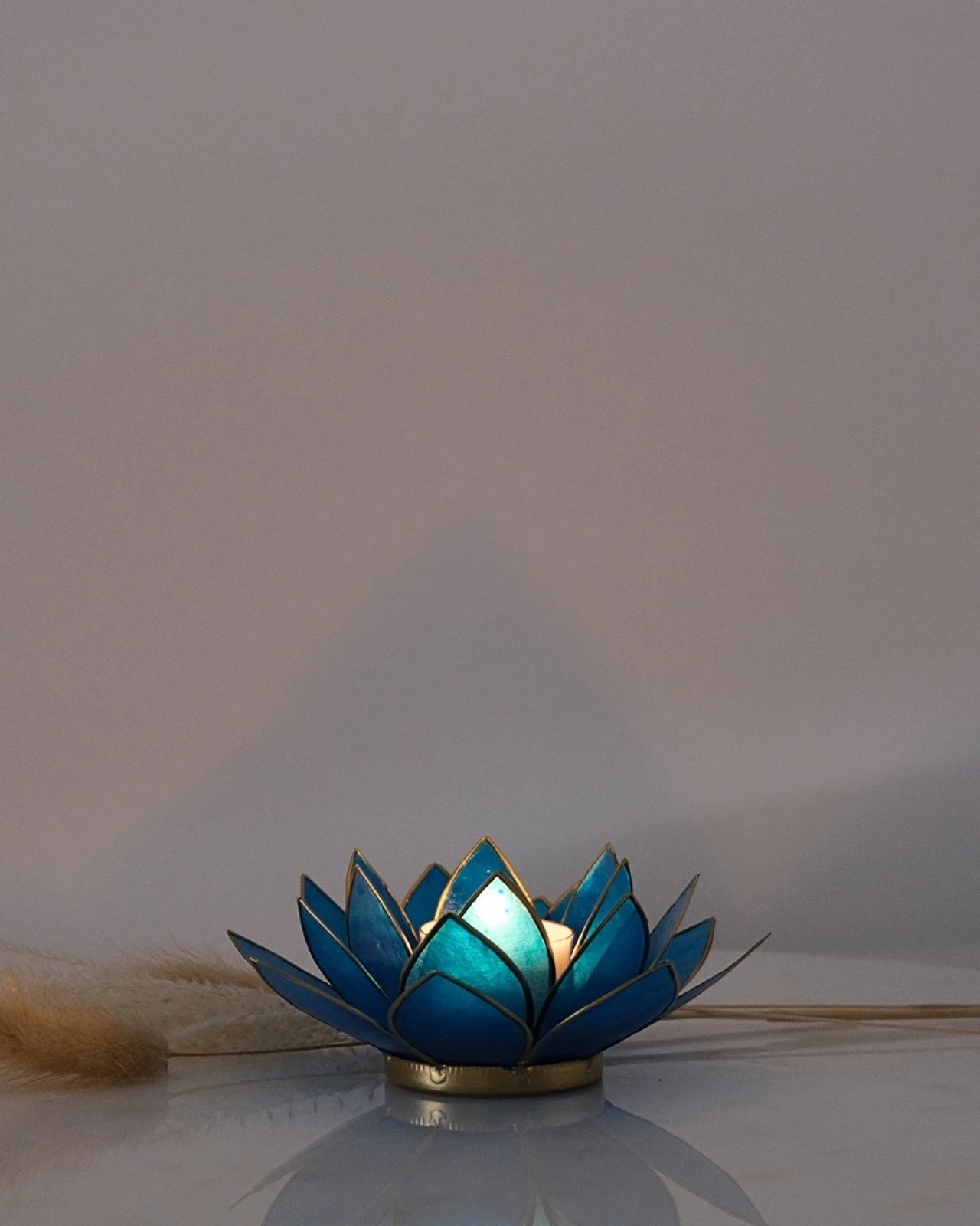 Puro: portacandele a forma di fior di loto in conchiglia 