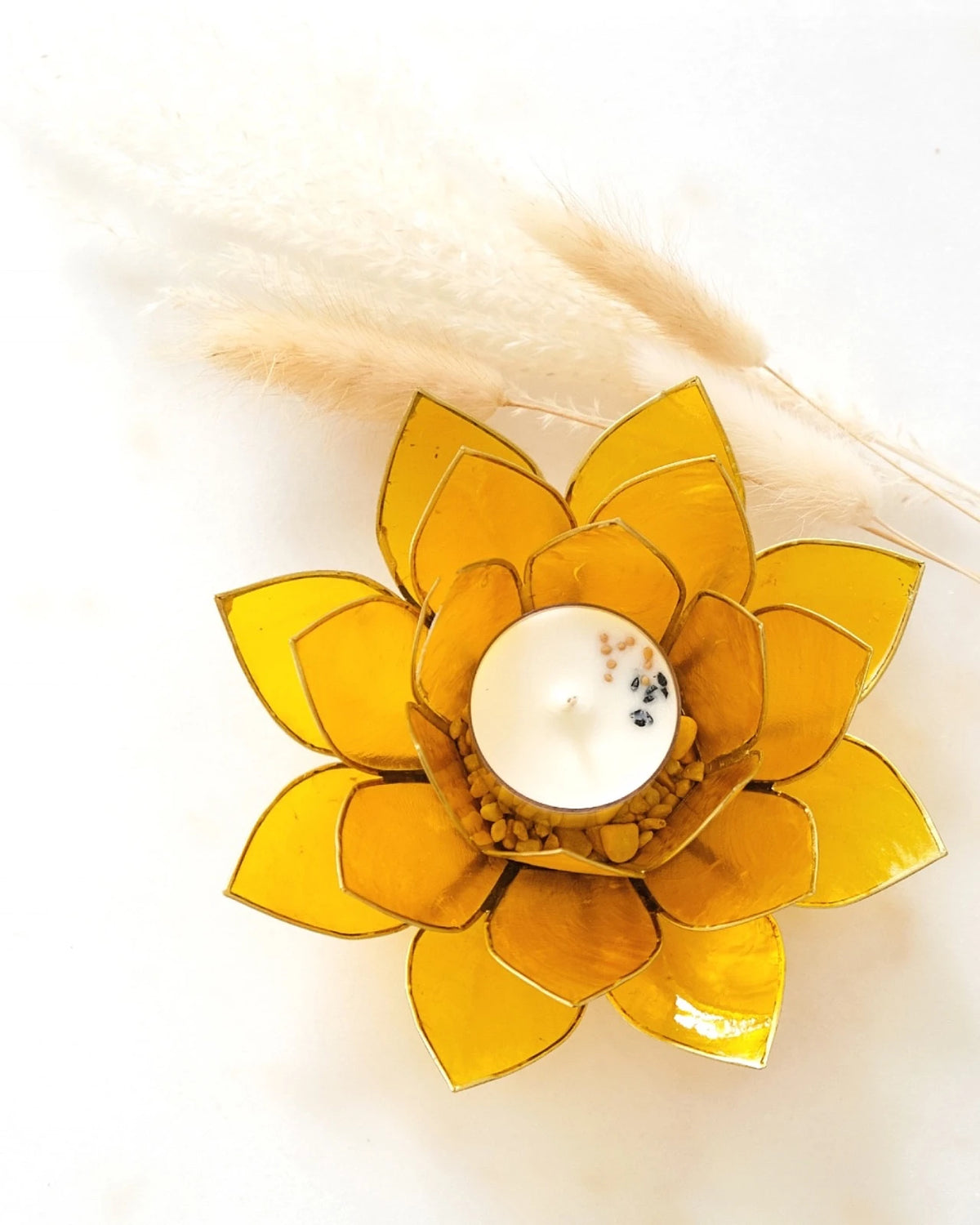 Puro: portacandele a forma di fior di loto in conchiglia colore giallo