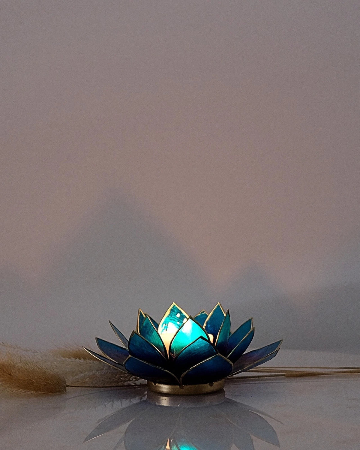 Puro: portacandele a forma di fior di loto in conchiglia 