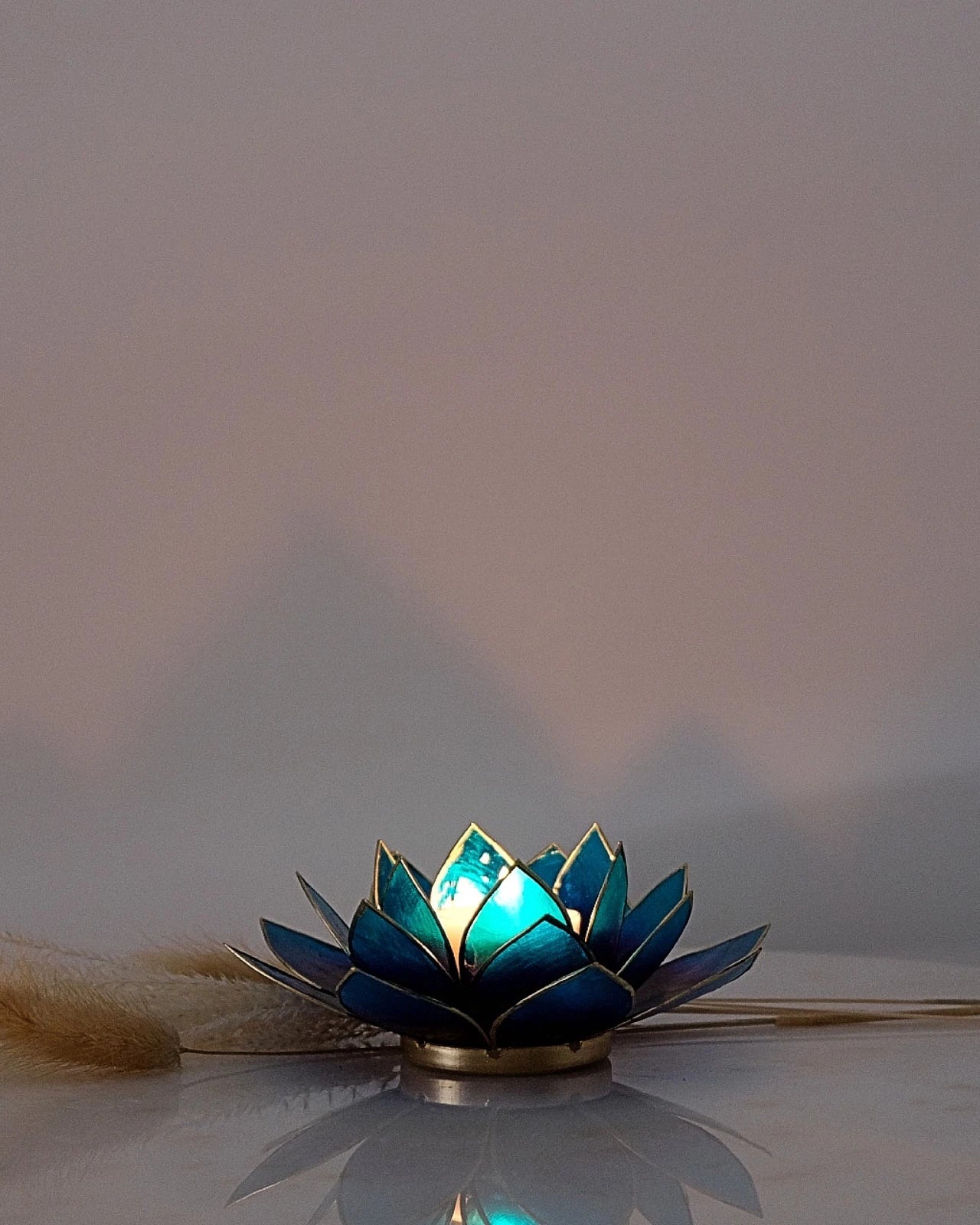 Puro: portacandele a forma di fior di loto in conchiglia 